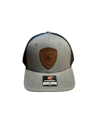 A gray hat with a brown patch on it