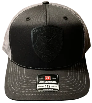 A black and grey hat with a patch on it