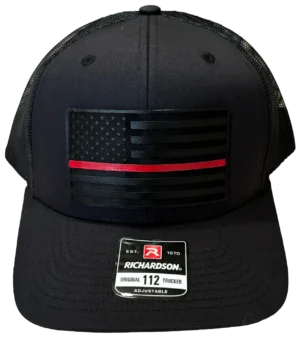 A black hat with an american flag on it.