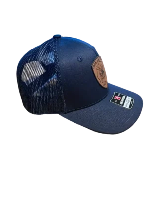 A blue hat with a patch on it